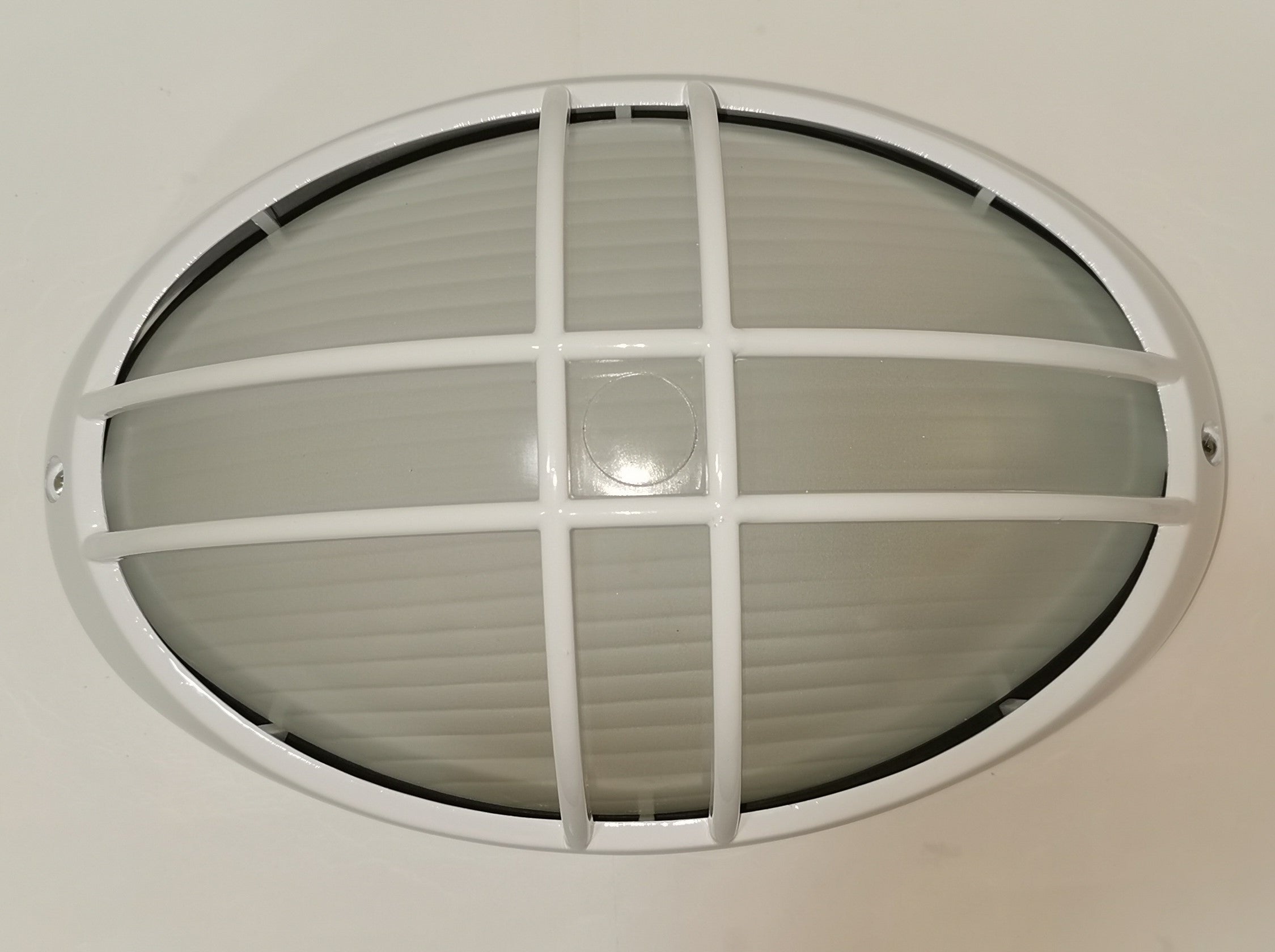 Aplique de Exterior Simon BD-9 Blanco | Diseño Ovalado con Rejilla – IP54